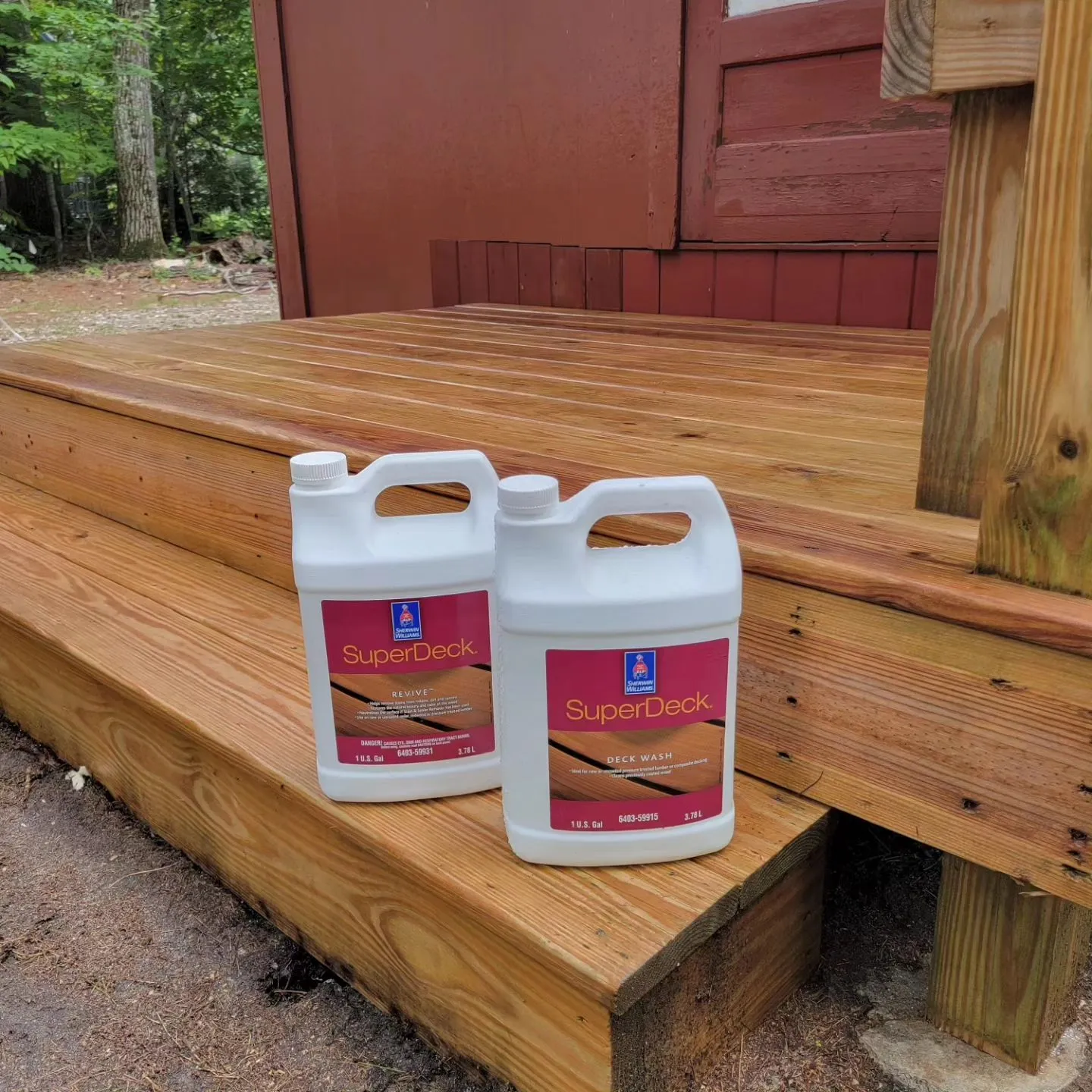 Deck staining in progress on a cedar deck in Raymond, Maine